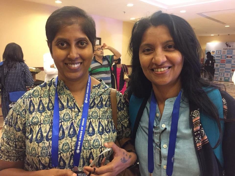 With colleague at FIAPO conference
